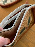 La pochette a 3 tasche 4