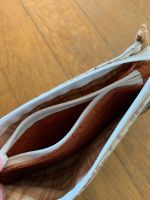 La pochette a 3 tasche 2