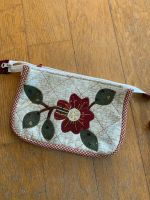 La pochette a 3 tasche 1